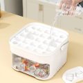 Ice maker with 50 cubes and easy-press lid, double-layer ice cube tray, refrigerator ice box for home ice storage.