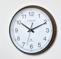 Champion wall clock 13 inches. Brown wall clock.Ticking motion clock.Original Toshiba battery included 🔋. 
