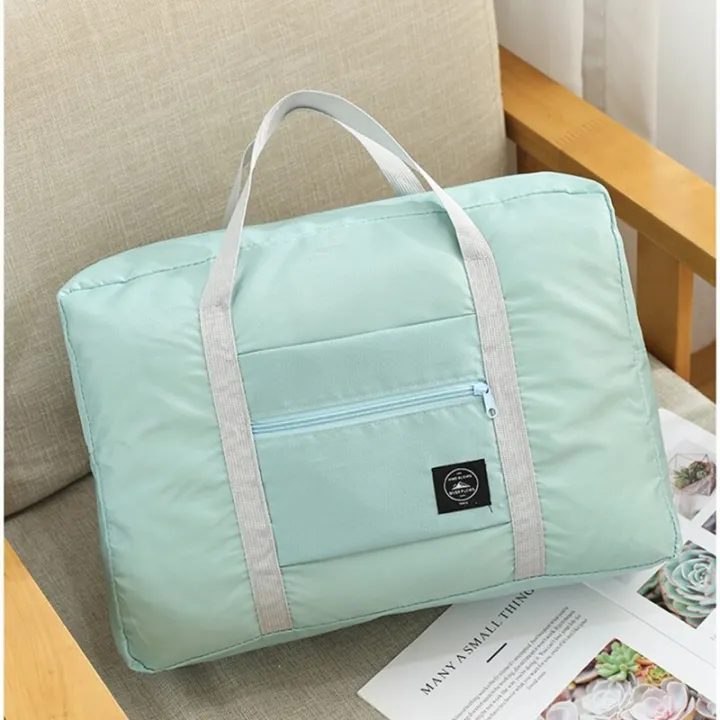 2023%20New%20Nylon%20Foldable%20Travel%20Bags%20Unisex%20Large%20Capacity%20Bag%20Luggage%20Women%20WaterProof%20Handbags%20Portable%20Travel%20Bags%20-%20Image%203