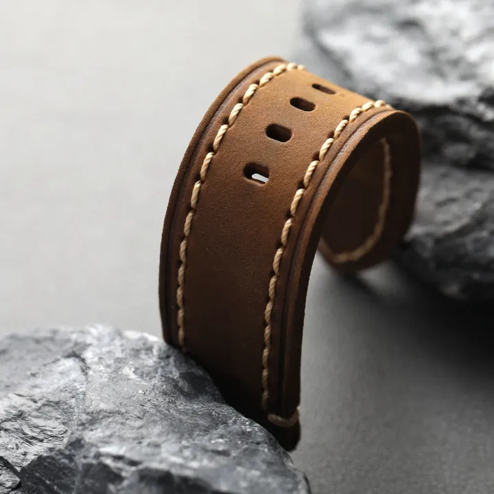 High-end%20genuine%20leather%20watchband,%20available%20in%20sizes%2020MM,%2022MM,%2024MM,%20and%2026MM,%20featuring%20a%20double-folded%20brown%20design,%20vinta%20-%20Image%206