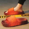 New Men Thick Bottom Slippers Platform Bathroom Slides Non Slip Trend Designer Shoes Ladies Female Mule Shoes Flip Flops Sandals. 