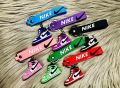 Trendy Nike Sneaker Keychain with Wrist Strap – Stylish Mini Shoe Key Ring for Bags & Keys.
