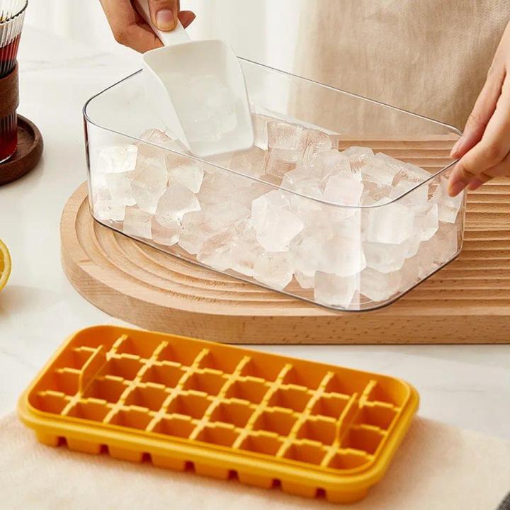 Ice%20Cube%20Tray%20with%20Lid%20&%20Bin,%20Upgraded%20One%20Button%20Release%20Ice%20Cube%20Trays,%20Ice%20Maker%20Mold%20for%20Freezer%20with%20Container,%2032x2%20PCS%20Tiny%20Ice%20Cube%20Tray%20Crushed%20Ice%20Tray%20for%20Chilling%20Drinks%20Coffee%20Juice%20-%20Image%206