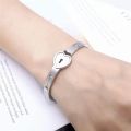 Concentric Lock Key Bracelet Set Titanium Steel Stainless Steel Jewelry Ideal for Couples Fashion Enthusiasts. 