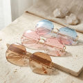 Retro polygon frameless trim sunglasses female personality curve mirror legs sunglasses male gradient color VU400 glasses 104 - Kurti. 