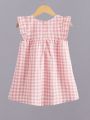 Girls cute pink and white plaid dress - exquisite lace flower decoration. 