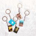 2 Mini books keychain(NOT READABLE), Novels keychain for school bags, English and Urdu Novels keychain for girls. 