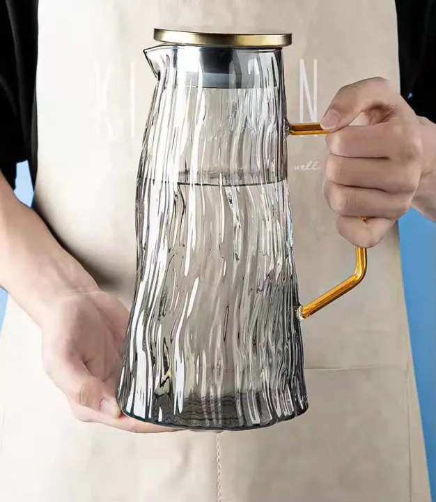 Luxury%20Hammered%20Glass%20Water%20Pitcher%20with%20Gold%20Tone%20Handle%20&%20Lid%20%20Modern%20Heat%20Resistant%20Iced%20Tea%20Juice%20&%20Sangria%20Decanter%20by%20Carpets%20Galaxy%20-%20Image%203