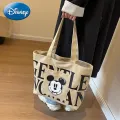 Disney Large Capacity Canvas Bag Women's 2024 New Trendy Cartoon Mickey Tote Bag College Student Class Shoulder Tote Bag. 