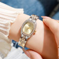 Luxury Gold Plated Ladies Fashion Quartz Watch Simple Rome Barrel-Shaped Stainless Steel Business Clock Quality Buckle Strap.