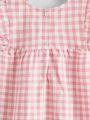 Girls cute pink and white plaid dress - exquisite lace flower decoration. 