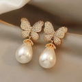 Korean version of fashion hot selling earrings simple temperament crystal butterfly pearl ear nail Earrings women. 