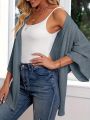 Oversized casual cardigan, women's plus size waffle knit cardigan with three-quarter length sleeves. 