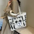 Disney Large Capacity Canvas Bag Women's 2024 New Trendy Cartoon Mickey Tote Bag College Student Class Shoulder Tote Bag. 