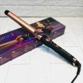 Hair Curler. Advanced Keratin Ceramic coating for bouncy, healthy-looking curls.  Luxury heat-resistant pouch.. 