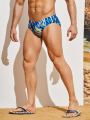 Men's sporty triangle swim shorts with geometric pattern print, quick-drying swim shorts suitable for pools and beaches. 