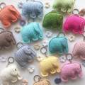 Hand made Crochet Elephant shape keychain with no eyes.. 