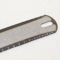 Double edged hacksaw blade. 