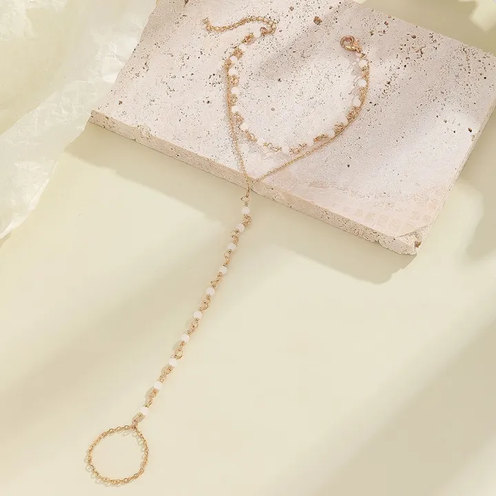 Multi%20Layer%20Pearl%20Finger%20Ring%20Bracelet%20for%20Women,%20Faux%20Pearl%20Elegant%20Accessory%20for%20Weddings,%20Dates,%20and%20Parties%20-%20Image%204