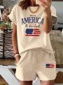 Summer Women's Comfortable and Loose White Cartoon Print Casual Loose Round Neck Short Sleeved T-Shirt Shorts Two-Piece Set. 