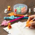 Set of 2 Writing Pencil Pen Gripper Holders for Children - Essential Aids for Kids' Learning and Writing Practice - Silicone Pen Correction Devices. 