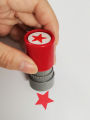 Red five-pointed star stamp encourage children teaching stamp Award stamp automatic ink school teachers family use. 