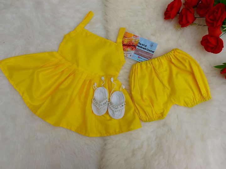 home stitched baby frock