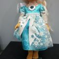 (B). Disney Frozen Snow Glow Elsa Doll Sings "Let it Go" Lights Up 13". 