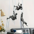 Retro Climbing Man Series Statue Wall Decoration Unique Touch Creative Climbing Statue Pendant Party Decoration.