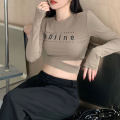 The destination of the new autumn women's o-neck long-sleeved Korean-style sexy crop top. 