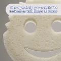 Free dual-sided scrubber + sponge (Scrub Daddy®) White smile face sponge. 