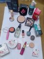 14 in 1 makeup deal. fixer, Pink magic, Cool Betty concealer stick, Romantic may lipstick, loose powder, primer, face powder, Beauty bank blush on, Cosmee highlighter, 4in1 glitter,base, Nail paint, 2in1 gel liner. 