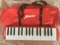 Hot selling professional playing class 32 keys melodica with canvas bag. 