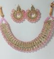 Maroon colour jewellery set of round crystal earrings and chowker neckless in maroon colour for girls and women for wedding party and eid in low price. 