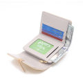 Wallet women's short 2024 summer new women's flower pendant three fold bag large capacity folding multi-functional student coin. 