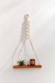 Macrame wall hanging shelf.