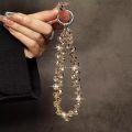 Luxury Sparkling Diamond Crystal Bead Wrist Strap Portable Chain Short Hanging Phone Charm Clip For Universal Use On Phone Cases. 