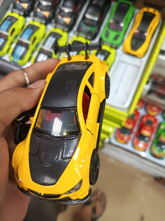 Chevrolet%20Mini%20Metal%20Car%20with%20Lights%20and%20Music%20%20-%201:24%20Scale%20Premium%20Quality%20Metal%20Car%20with%20Openable%20Doors%20-%20Image%204