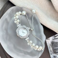 Double-Row Pearl Pull-Open Bracelet Diamond-Encrusted Case Arabic Numeral Scale Ladies Quartz Watch. 