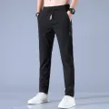 2024 Ice Silk Men's Pants Summer New Black Gray Thin Business Casual Pants Outdoor Elastic Breathable Straight Leg Sweatpants. 