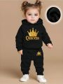 The newborn baby girl crown printed fleece hoodie and casual sport long pants set is suitable for outdoor use. 