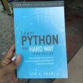 Learn Python the Hard Way: A Very Simple Introduction to the Terrifyingly Beautiful World of Computers and Code

Book by Zed Shaw. 