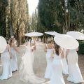 A white paper umbrella for wedding decoration - handmade traditional Chinese bridal sunshade - photo prop and party accessory.