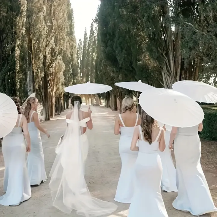 A%20white%20paper%20umbrella%20for%20wedding%20decoration%20-%20handmade%20traditional%20Chinese%20bridal%20sunshade%20-%20photo%20prop%20and%20party%20accessory%20-%20Image%202