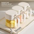Kitchen seasoning bottles Home seasoning box Glass seasoning jar Moisture-proof sealed salt jar with spoon seasoning bottle.