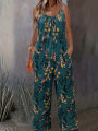 Plus-size floral print vacation style jumpsuit with pockets. 