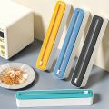2-in-1 Plastic Wrap & Foil Dispenser with Slide Cutter - Durable Kitchen Organizer with Suction Cup Base for Home Use. 