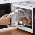 Microwave Food Splash Guard High Temperature Resistant Food Heating Cover with Steam Vent and Handle Transparent Plate Cover. 