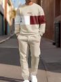 The new men's round-neck hoodie set for Spring and Autumn 2025 features a casual and comfortable 3D letter pattern print. 