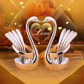 Portable fork and spoon cutlery set 304 stainless steel cutlery with swan rack table fork and spoon storage rack cutlery set. 